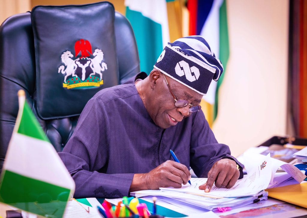 BREAKING NEWS: President Tinubu has officially signed the student loan bill into law. 1 President Bola Ahmed Tinubu signing documents