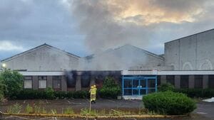 Protesters cheer as fire guts building earmarked to house asylum seekers in Ireland. 1 4211866 17 articlesmall FIRE2